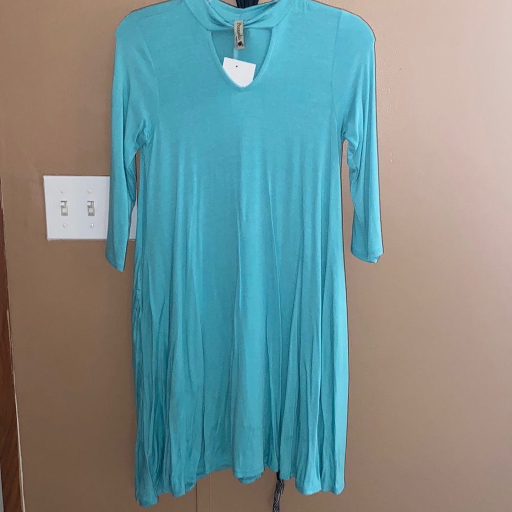 A blue dress, it’s from Pomelo it’s a teal color